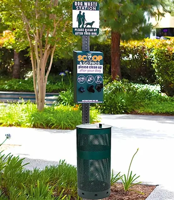 Commercial pet waste station installation by Scoop & Go Pros - dog waste bag dispenser for HOAs and apartment complexes in Colorado